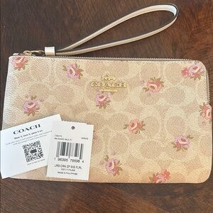 NWT!  Beautiful Coach Cream and Pink Floral Wristlet - perfect for summer!